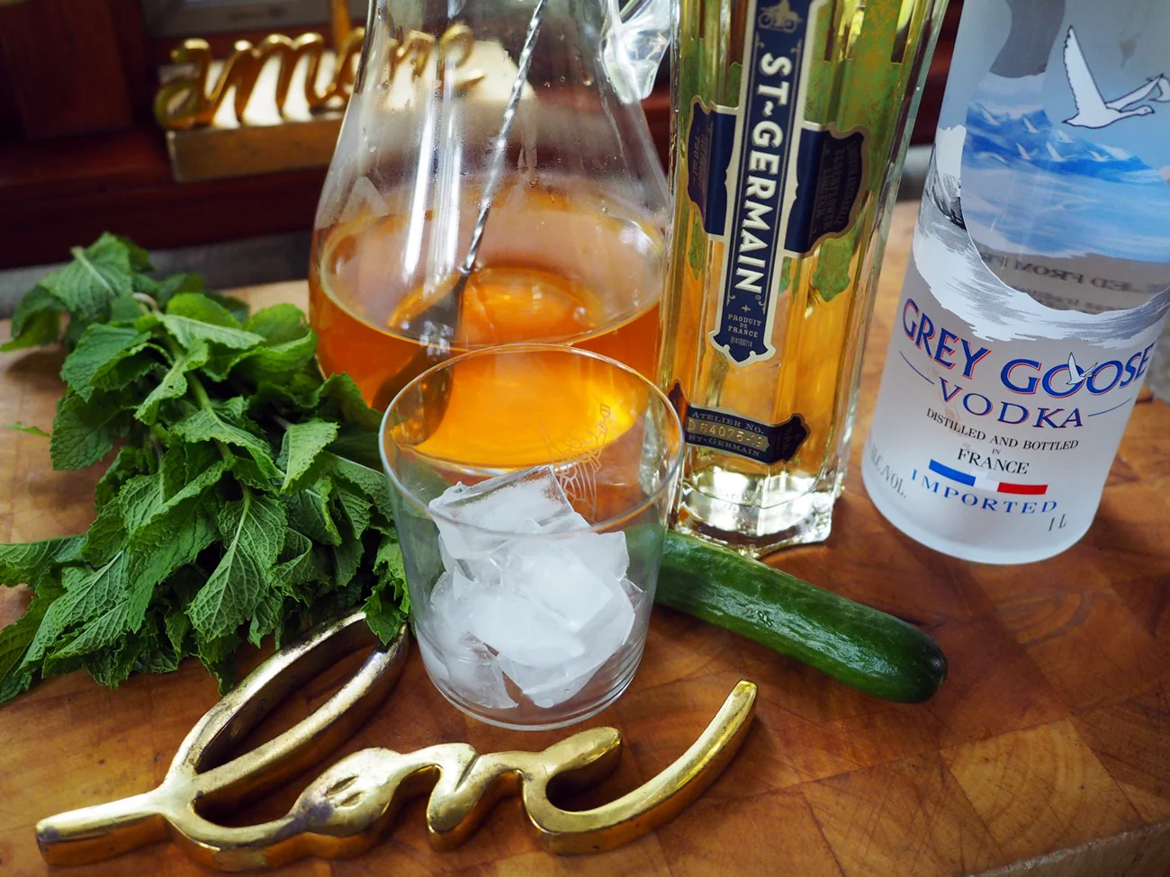 Cocktail set up. Mint, Freshly brewed Green Tea, St Germain, Vodka and cucumber