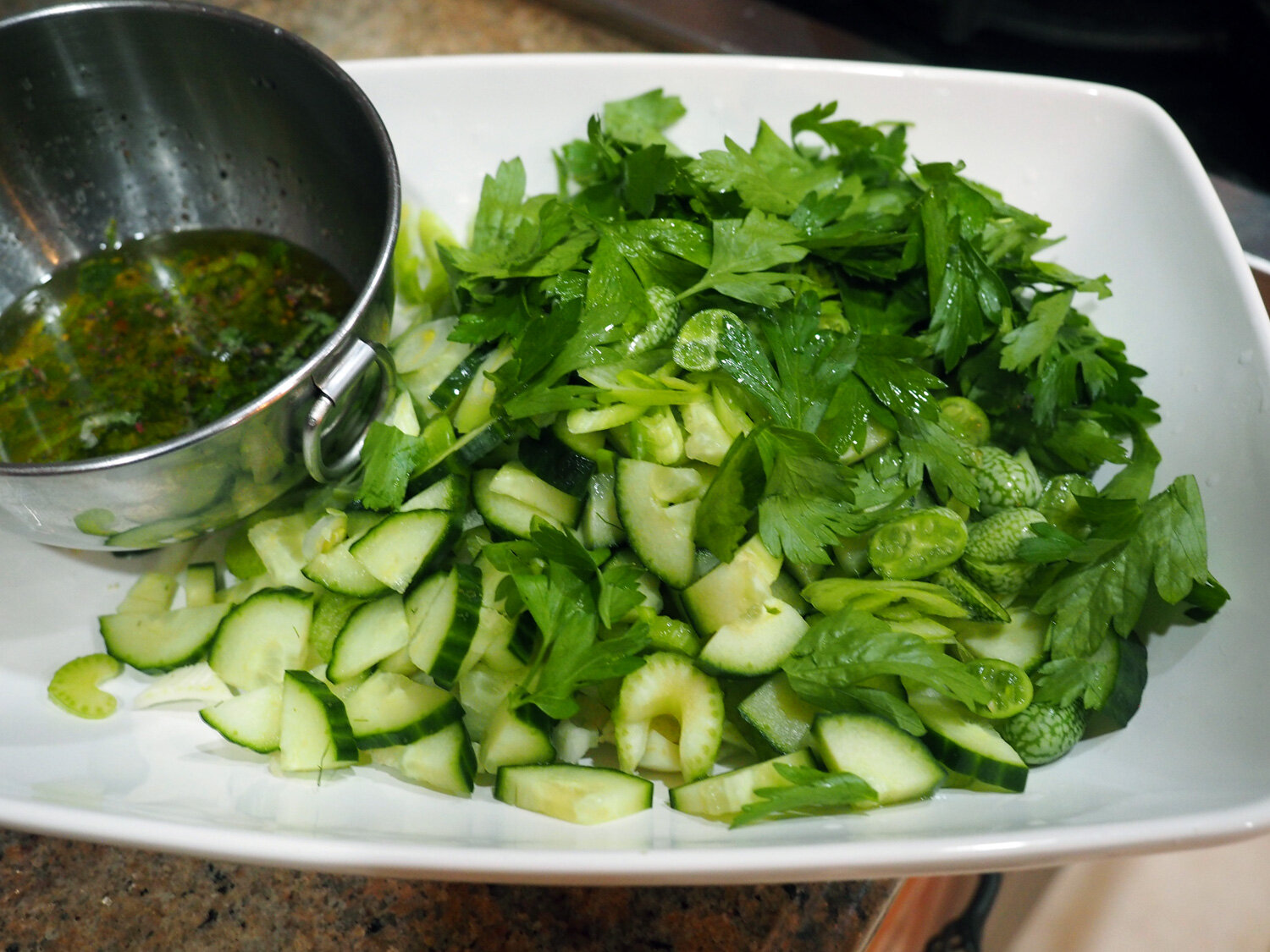 Whisk the oil, salt, pepper, scallions, mint together.