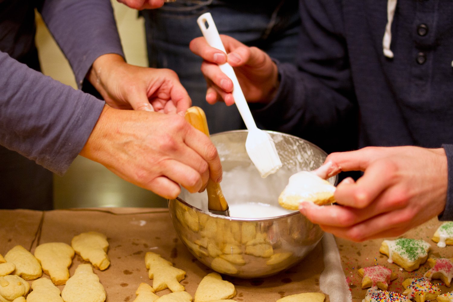  It’s a mad rush to get the icing on followed by sprinkles before it dries up. All hands on deck. 