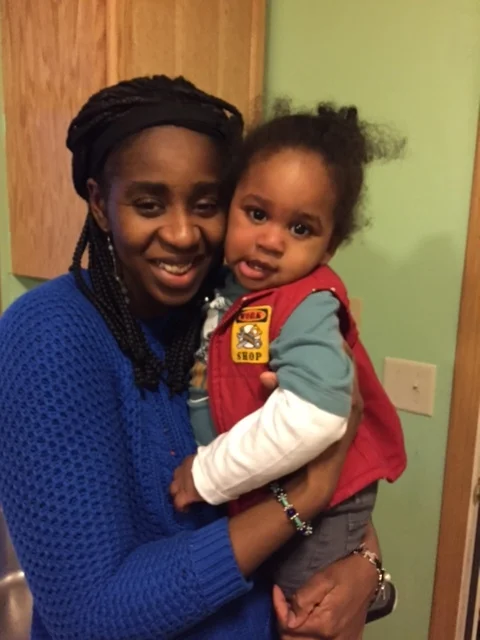 Recently baptized resident, Amanda, with her sweet baby. 