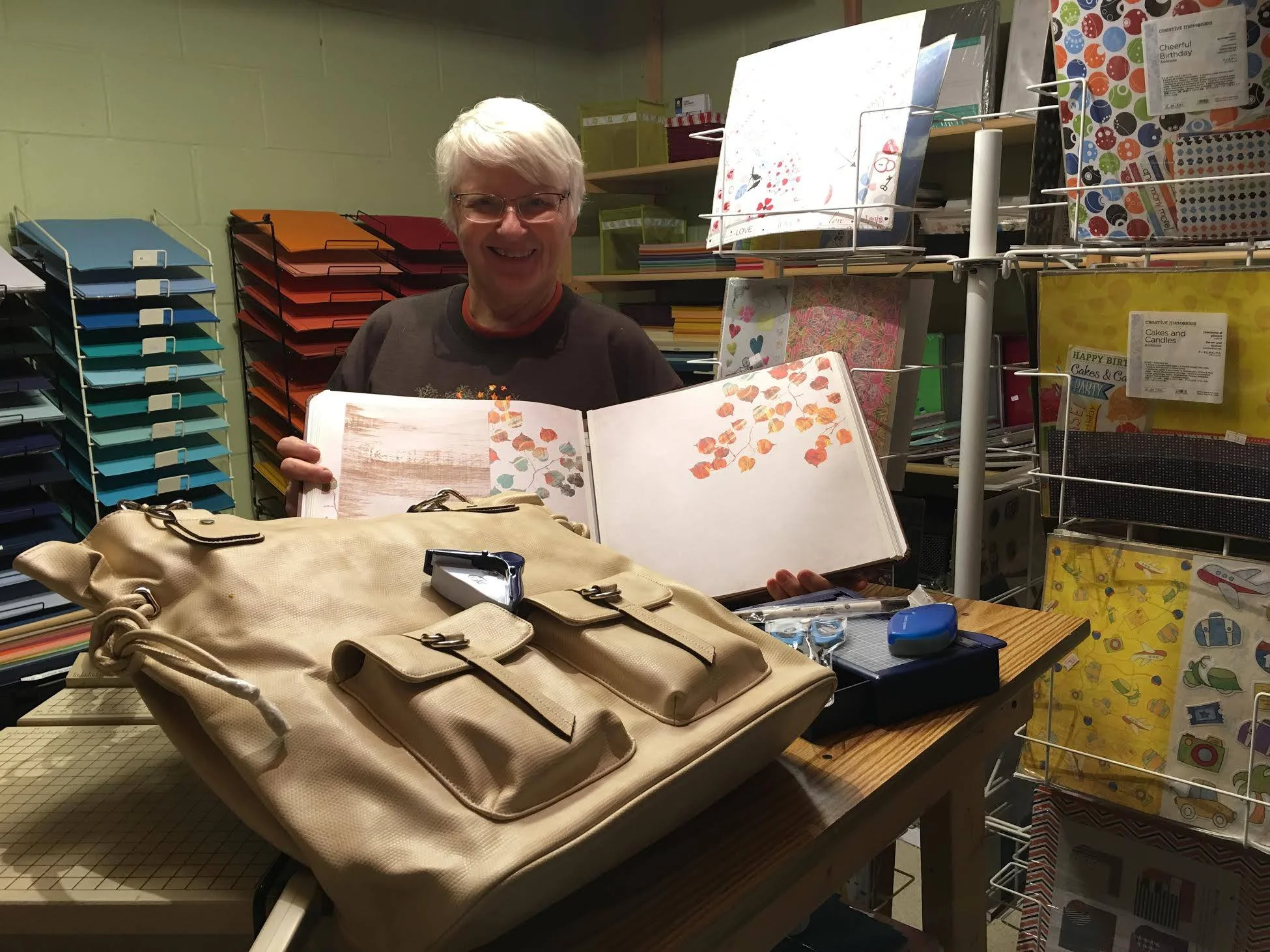 Mary Mosbey with her scrapbook supplies