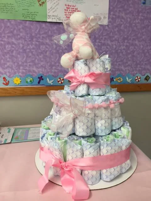 "Diaper" cake. More photos One mom wrote, "I would like to take a moment to thank all the staff and organizing committee, and all who participated in our baby shower. May our good Lord richly bless you all. Again, thanks!"
