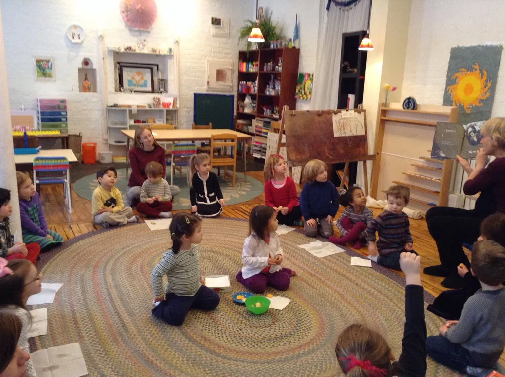 Students listen to a story and enjoy a healthy snack.