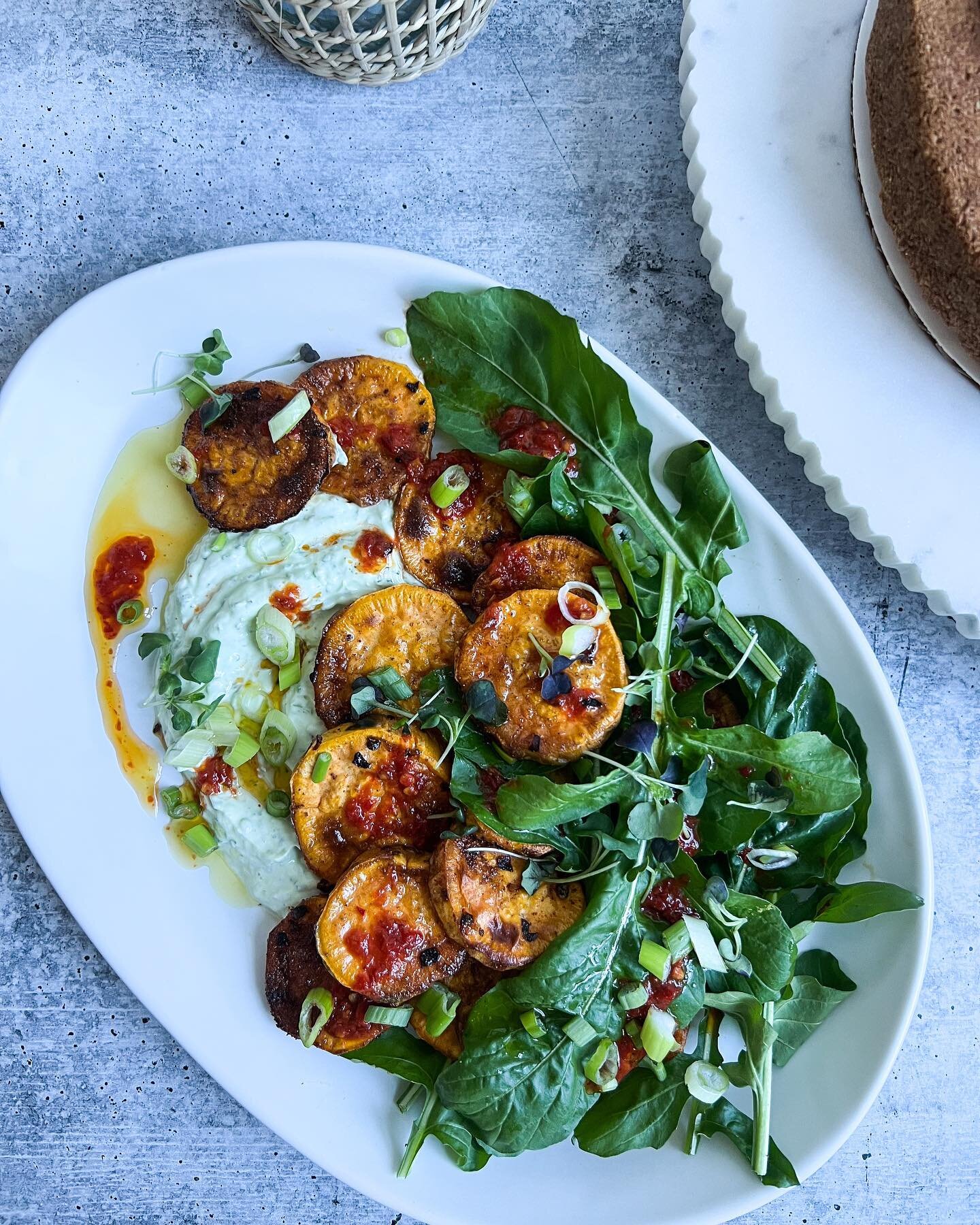 Harissa Roasted Sweet Potatoes, Herbed Yogurt, Arugula, Citrus Vinaigrette 

As promised, sharing some easy dinner ideas with greens I&rsquo;ve been growing in my garden. You could easily add a protein like grilled shrimp or tofu to this or serve as 
