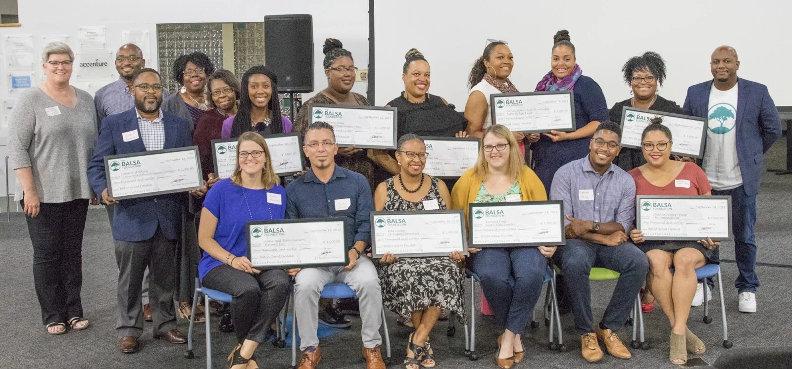 The BALSA Foundation Summer 2018 BALSA Grant awards. Each first-time entrepreneurs will receive $1,000 in cash grants, along with professional services and mentorship to help them start and grow their business. (Sitting Left to right: Anna and Tello Carreon, Elevada LLC; Kita Quinn, 1K Digital Memories; Rachael Cross, Simply Chic Jewelry; Charlene Lopez and Darren Young, The Fattened Caf; Standing Left to right: Colleen Mulvihill, SLEDP; Aziz Traore, BALSA Foundation; Julius B. Anthony, St. Louis Black Authors of Children’s Literature; Monica Turner, Angela Byrd and DeAnna Tipton, Byrds of Expression; Whitney Jones, Transitional Homes 4 You; Shelby Farr, Luxury Body Bar; Serrita Sydnor and Alicia Cooper, Butterfly Effect G2W; Charlene Williams, C.H.A.R.M.’D; Michael Bynum, BALSA Foundation).