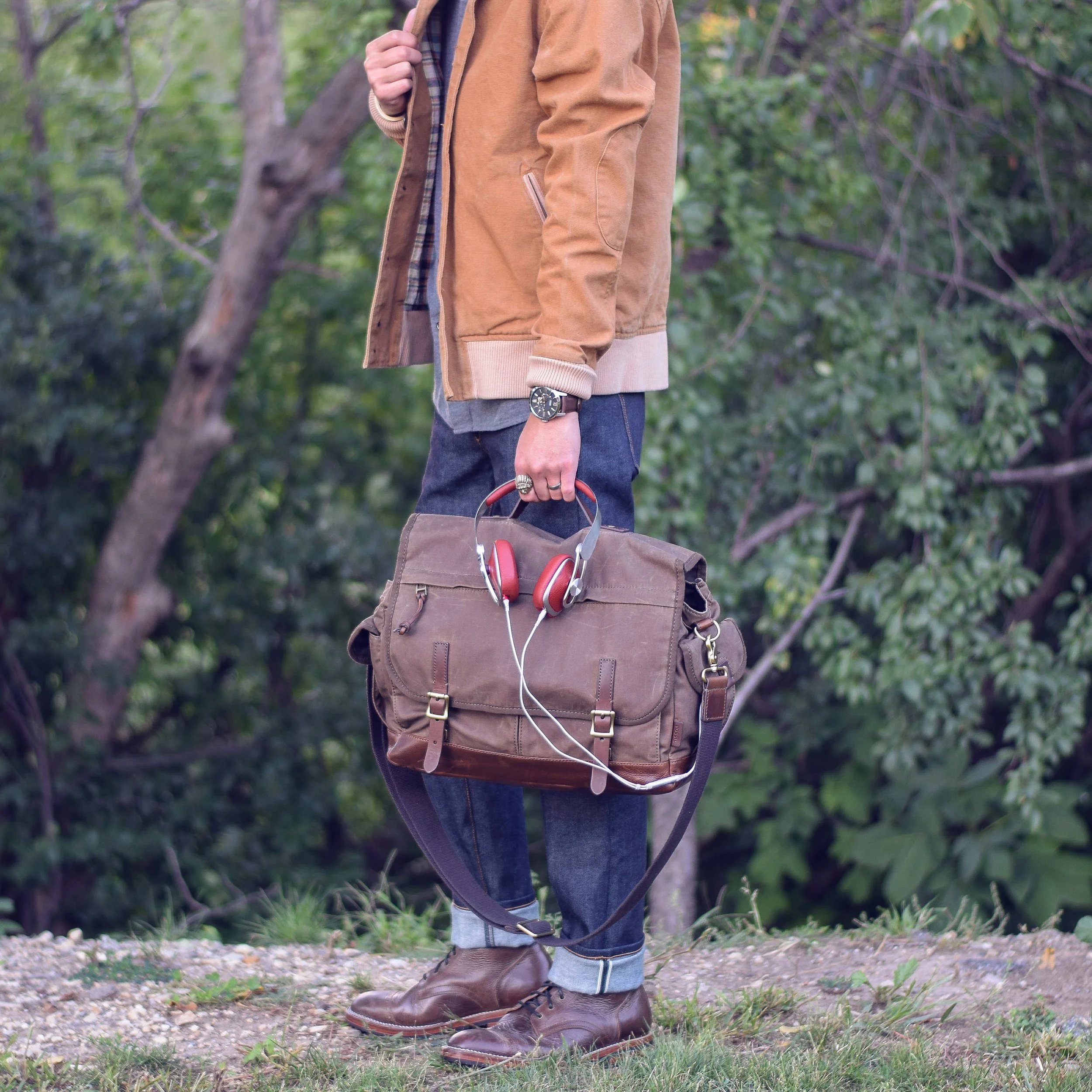 Always on the go, with my Moshi Avanti headphones and Defender Top Handle Messenger bag from Fossil . 
