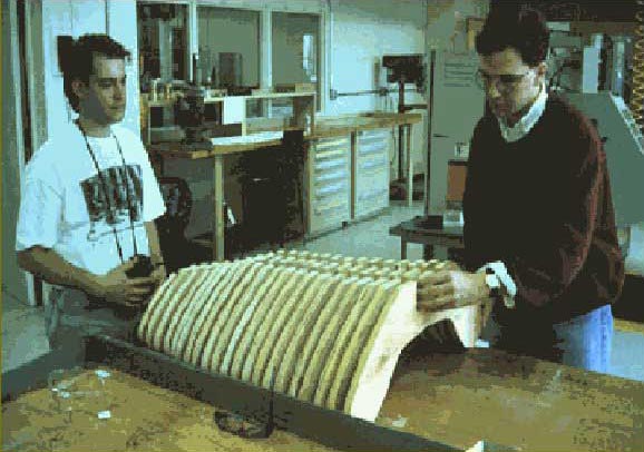 Figure 10: Students asssembling pieces cut by a CAD / CAM operated water jet cutter for the chair design studio project at MIT.