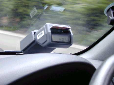 Figure 1: An electronic toll-road charging device placed on dashboards of motor vehicles in Singapore.