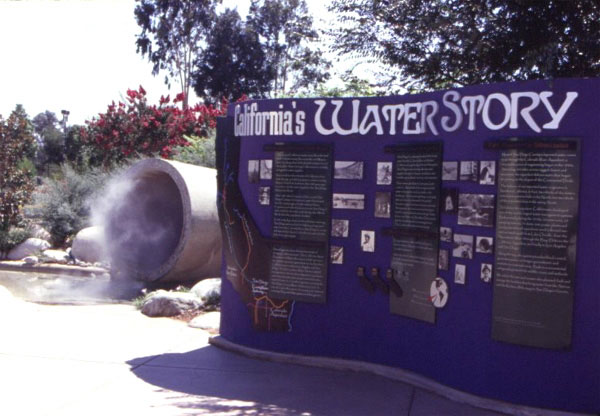 Figure 4: The Water Conservation Demonstration Garden in San Diego, California: An interpretive sign of the California Water Story and a large-scale model for a water supply pipe.