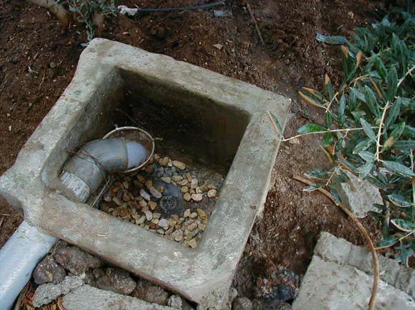 Figure 3.6: The manhole, together with a stainless steel sieve filter in al-Himmeh.