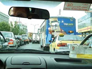 A street in Amman seen from inside a taxi car. (The JordanTimes)