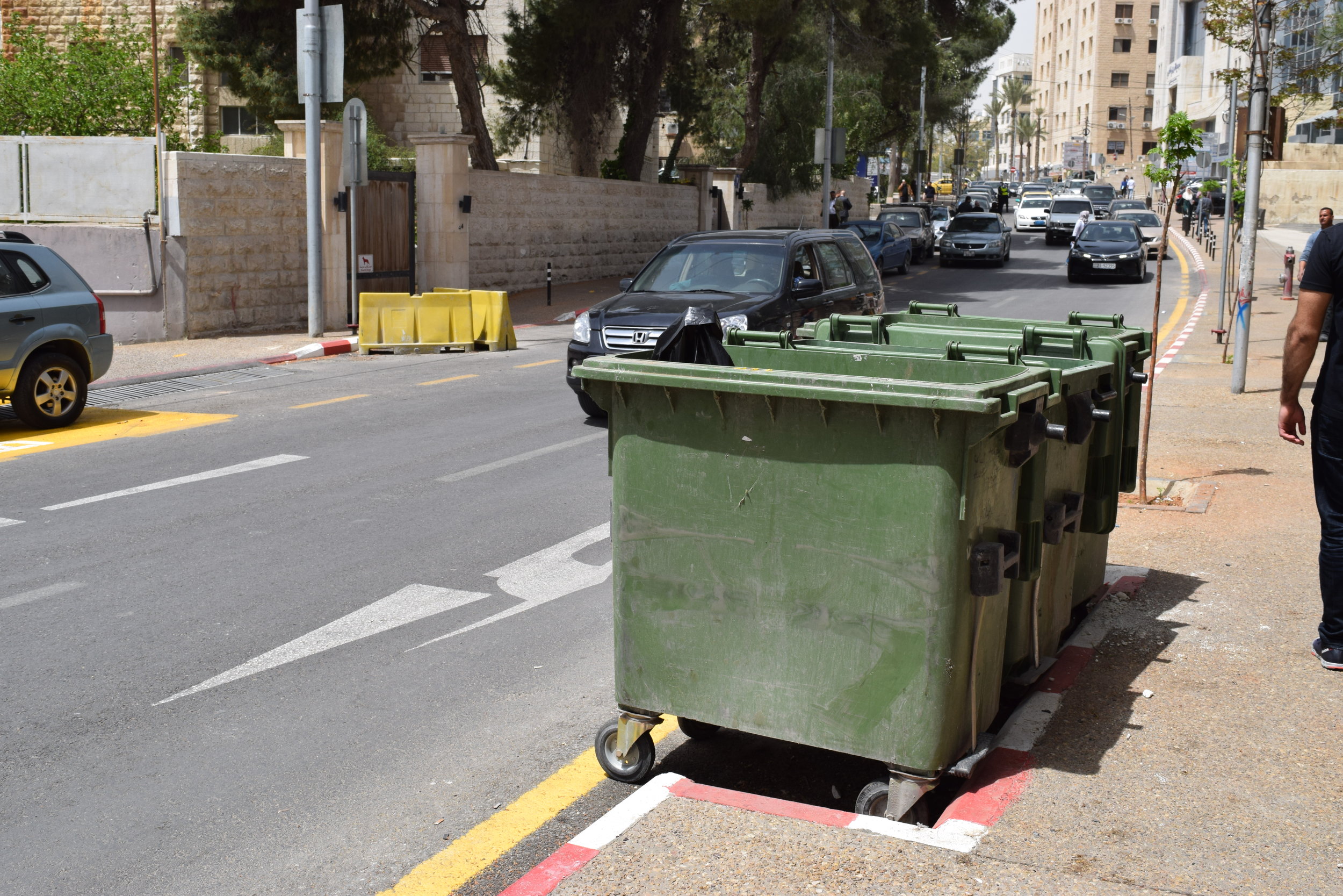  An image showing a designated area for dumpsters. 