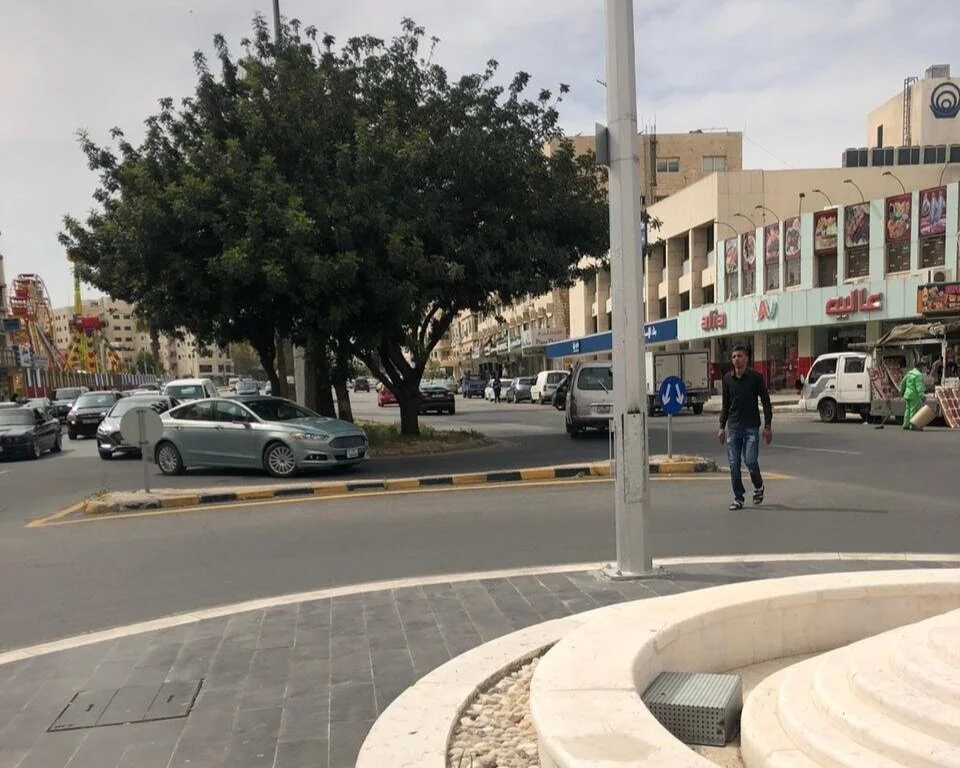 A new U-turn lane installed along the street to facilitate traffic flow.