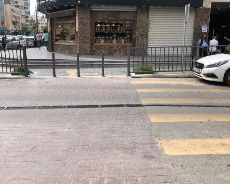  The old zebra crossing has not been aligned with the new crossing for pedestrians. Accordingly, the preexisting zebra crossing leads to a fence rather than to an opening. 