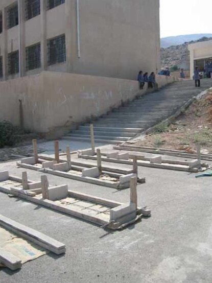   View of the concrete benches under construction.&nbsp;  