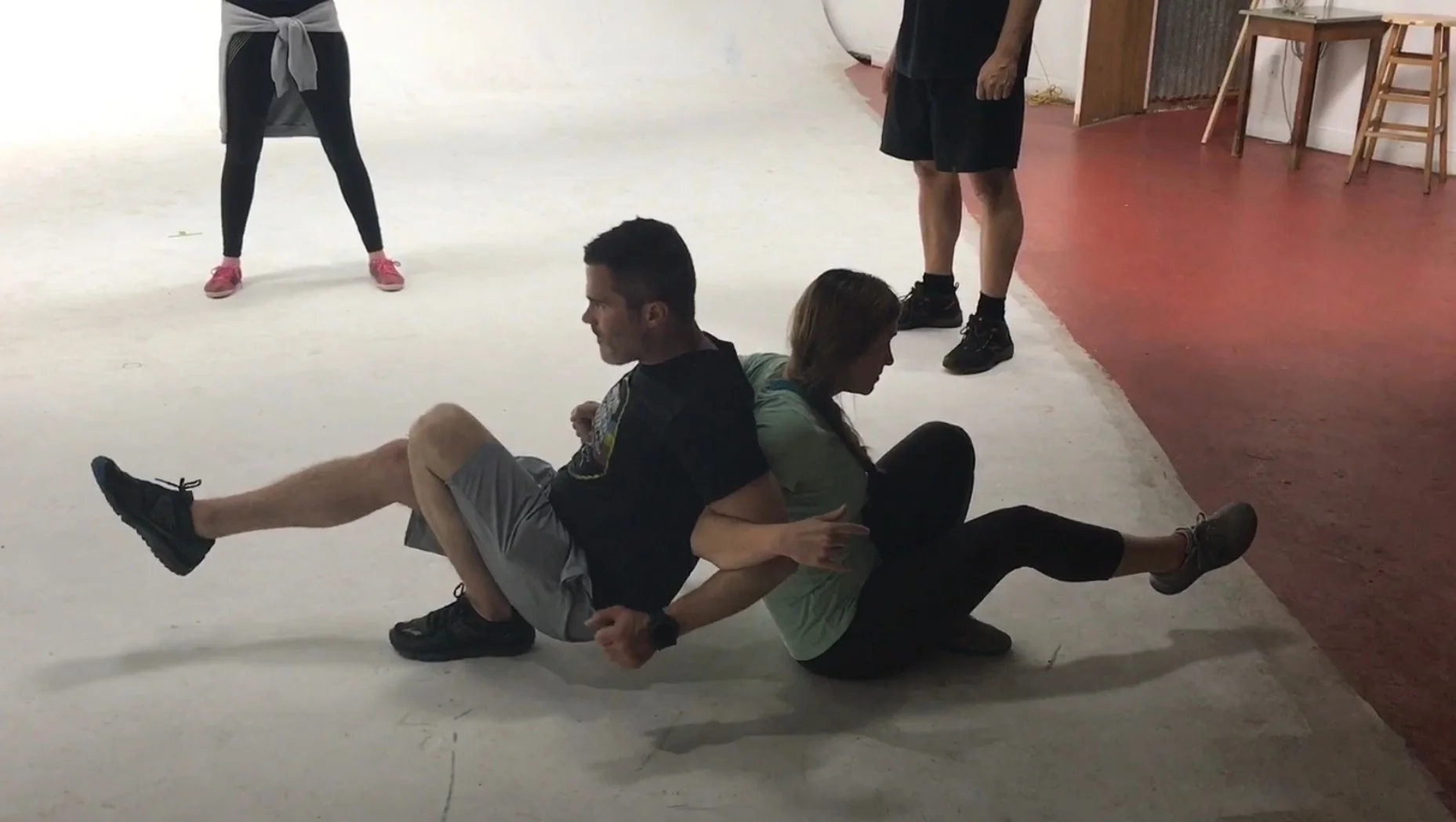 Partner Pistol Squat