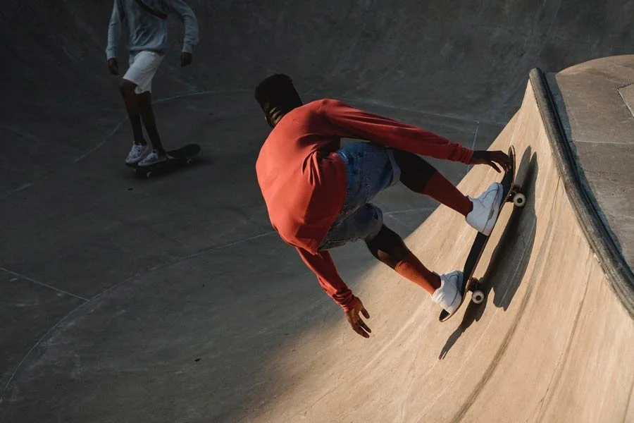 Adult skateboarding outdoors.
