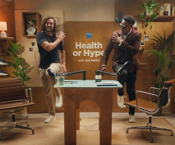 Darryl Edwards demonstrating a movement snack with Joe Wicks