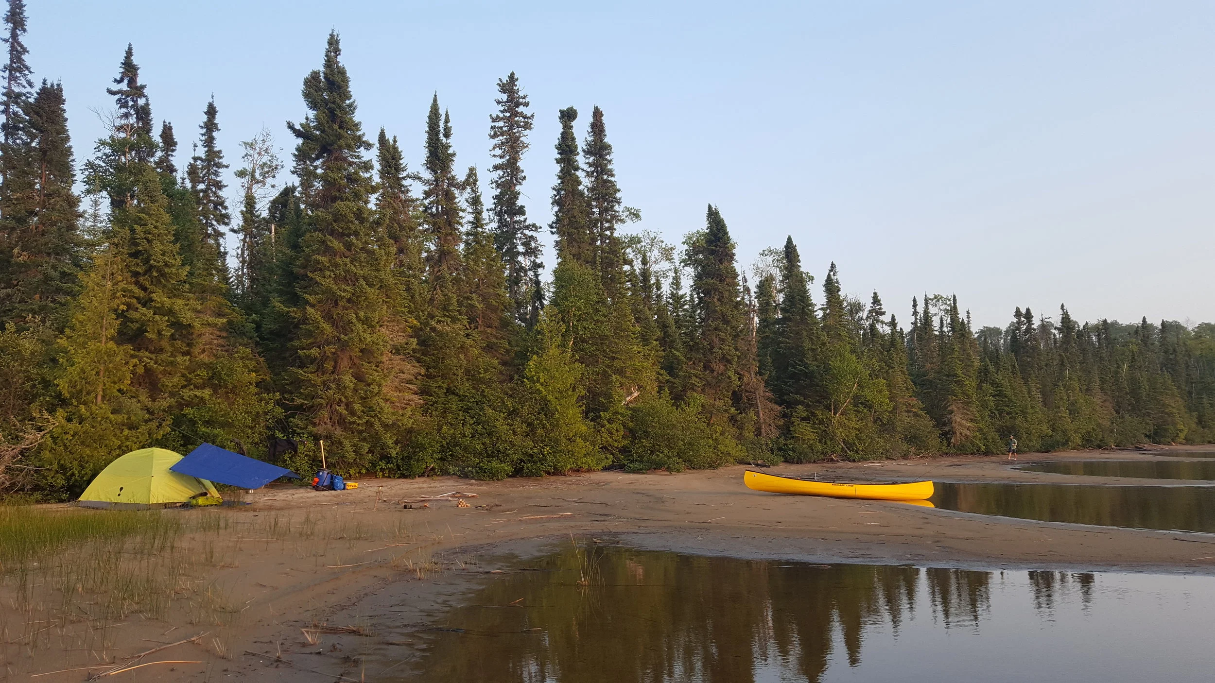 The only option for a campsite on Pickett Lake was the exposed sand normally submerged in higher water