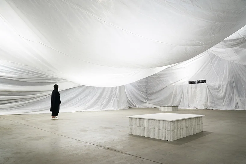 back view of the space, two out of seven long throw projectors in total used for the projection mapping installation