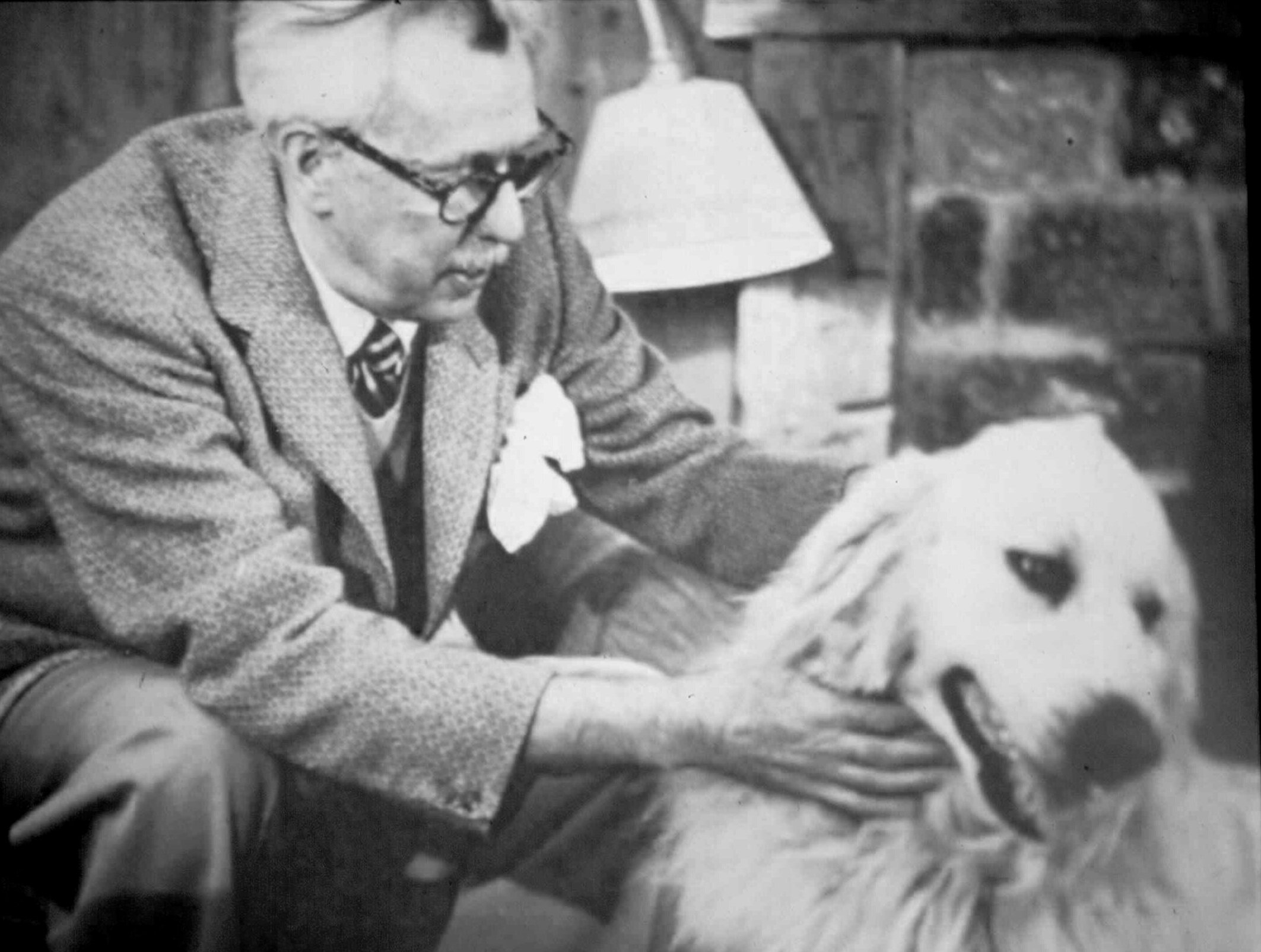   Thurber with Dog   © The Thurber Estate  