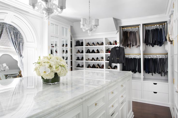  We'd be happy to have this be our kitchen or our closet! This marble island is definitely a gorgeous addition to the space and provides great storage!&nbsp; 