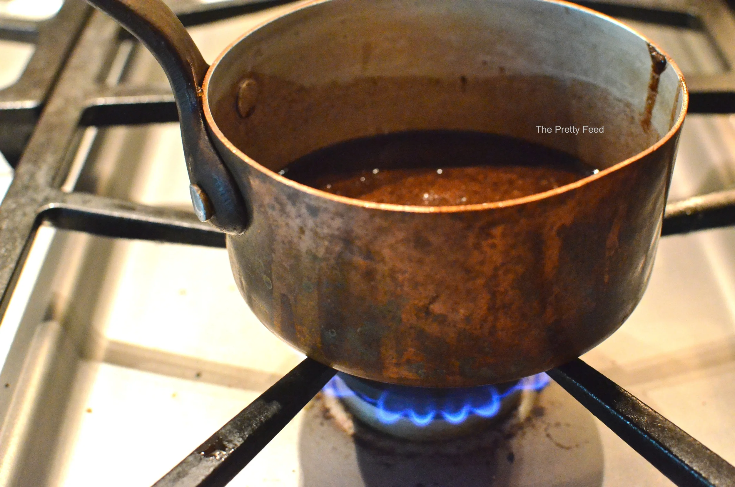 On low heat slowly mix ingredients together and bring to a boil. Then keep it warm until your banana ice cream is ready. 