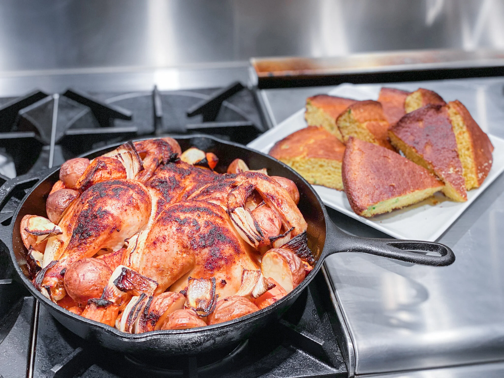 Cast Iron Spatchcock Chicken with Roasted Potatoes and Onions — The