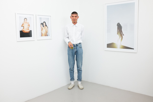 Ren Hang at Capricious 88, Photograph by Max Mikulecky