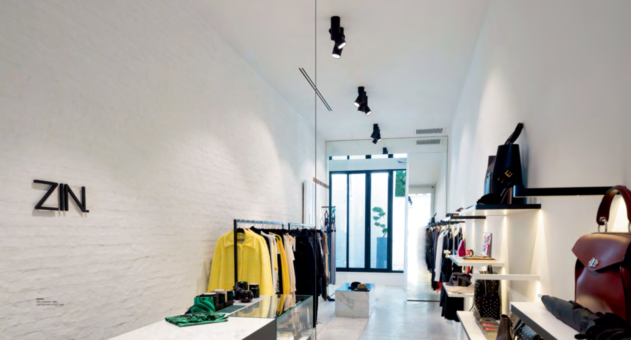 ZIN Hasselt, high fashion store designed by LOFT22 architecture and styled with art from LOFT22 art space, featured in the newest catalogue of Modular Lighting Instruments.