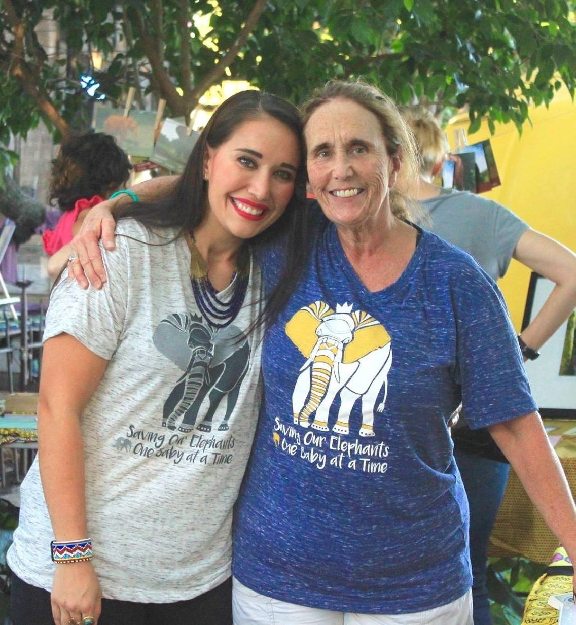 Pamela Leal, right, and daughter meghan work to raise funds for DSWT.