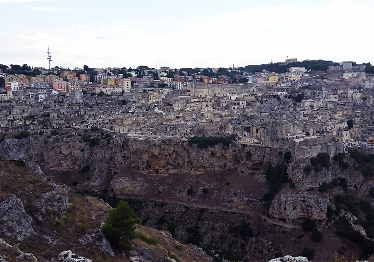 Image 3: The layers of Matera, thousands of years in use, as seen from across the Gravina. September, 2015. Photograph by Jessie Wilcox