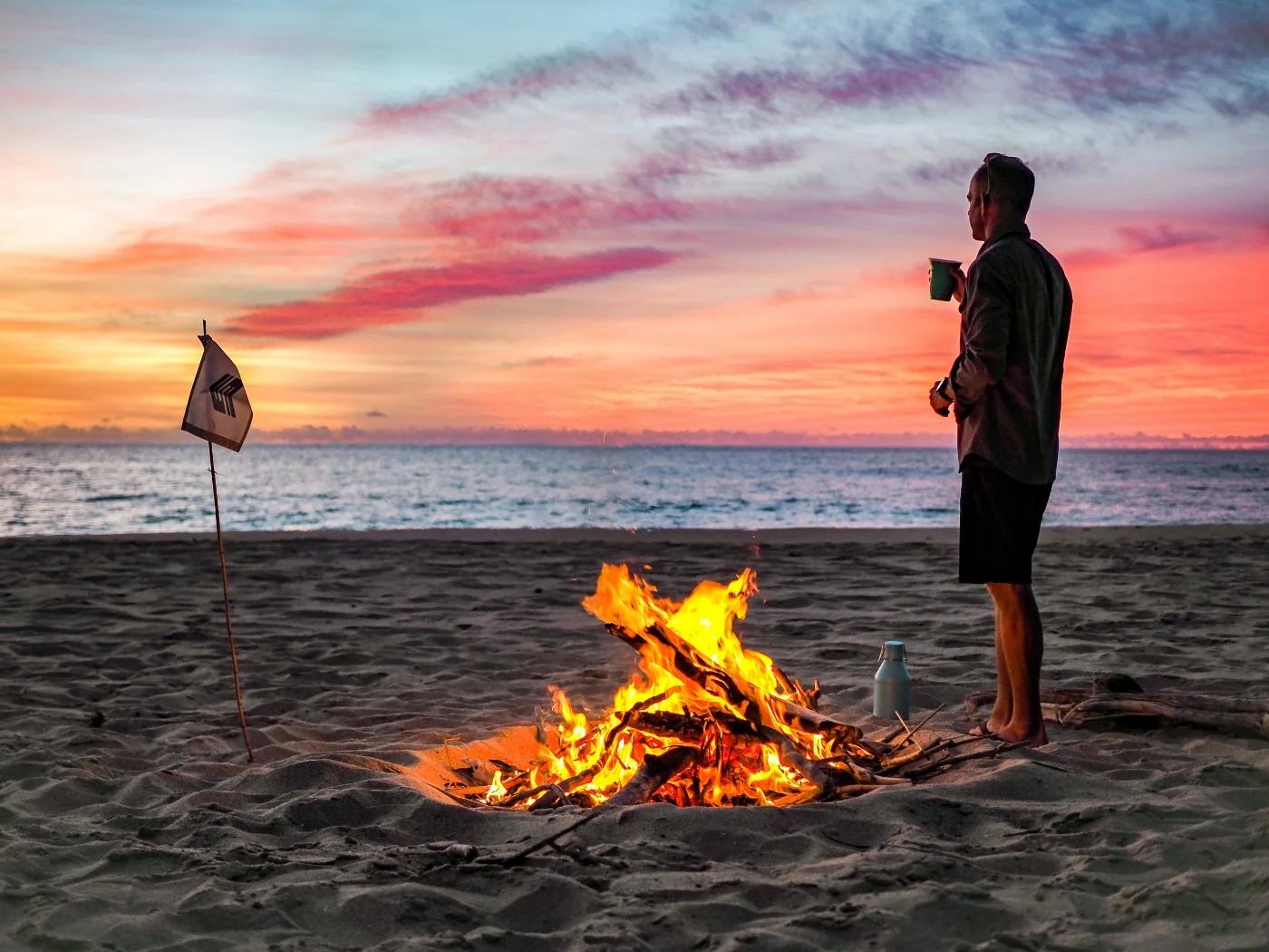 Beach bonfire with our Miir growler filled with mezcal margaritas