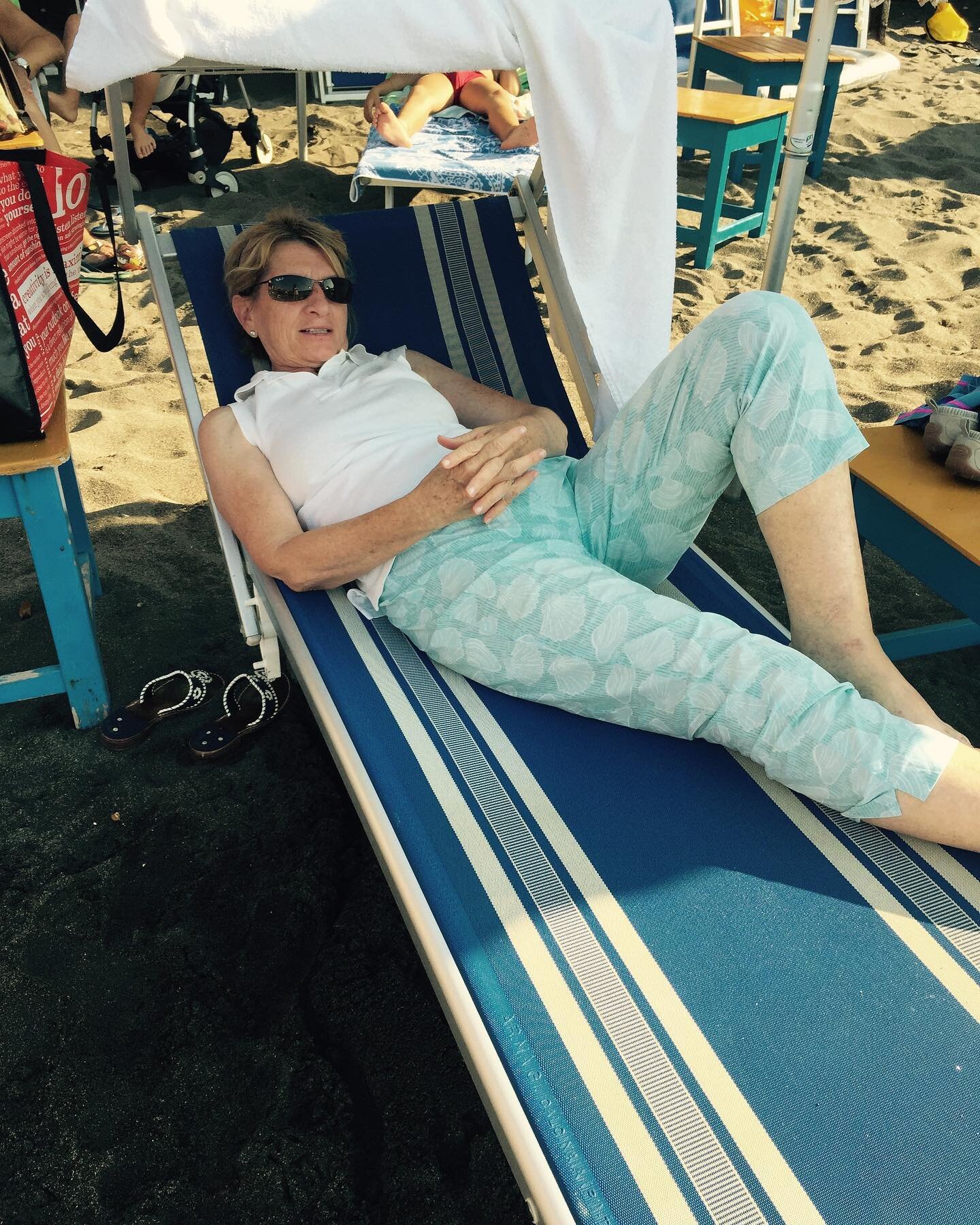 Happy Mother&rsquo;s Day to my mom, whom I miss so much. This is how I like to think of her, loafing on a beach chair in Sorrento in Lilly Pulitzer pants, not giving an f. #mothersday #mother #mom