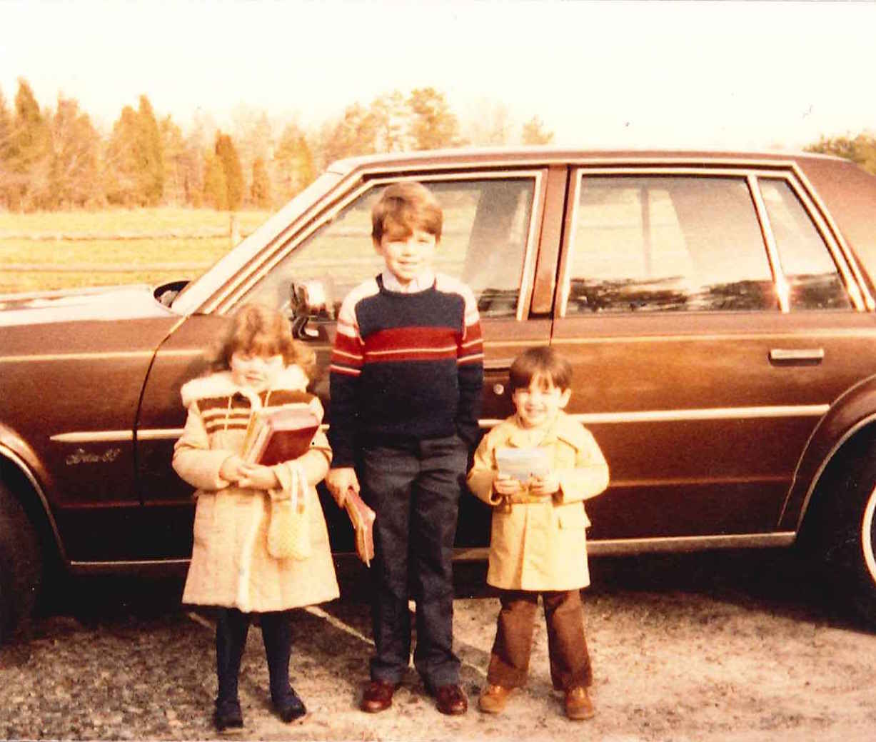 Deanna, older brother Brian, and younger brother Phillip ready to go to Sunday morning church service. Iron Station, North Carolina - 1983