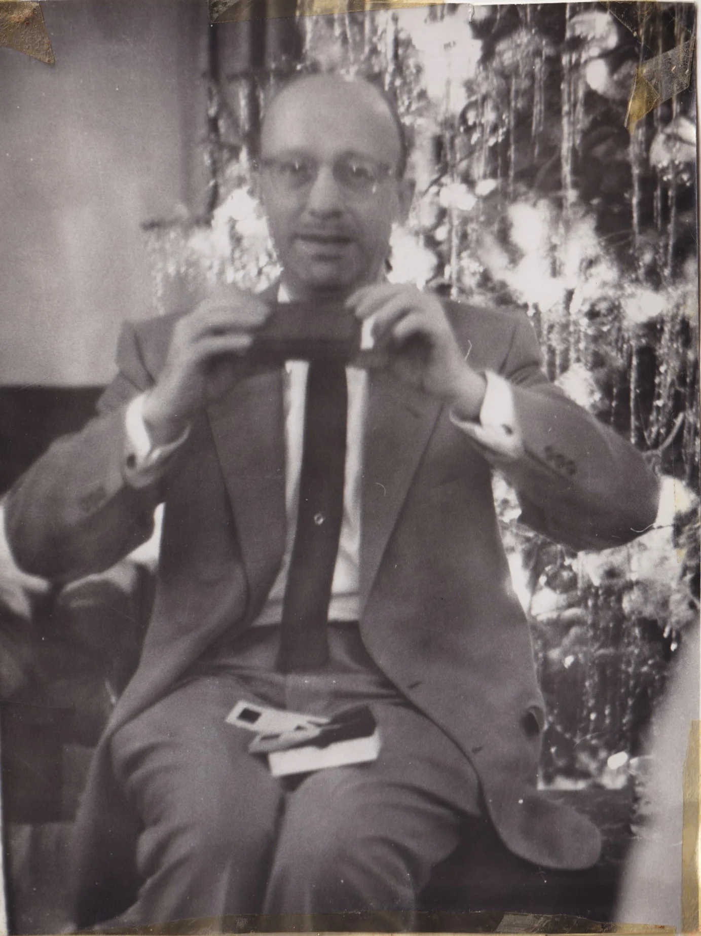 Photograph with damage from scotch tape.