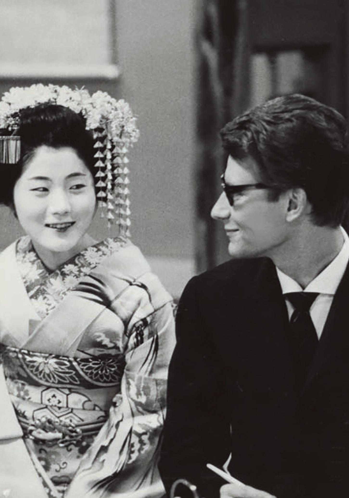 Yves Saint Laurent and a courtesan wearing traditional garments during the designer’s first trip to Kyoto, Japan in April 1963