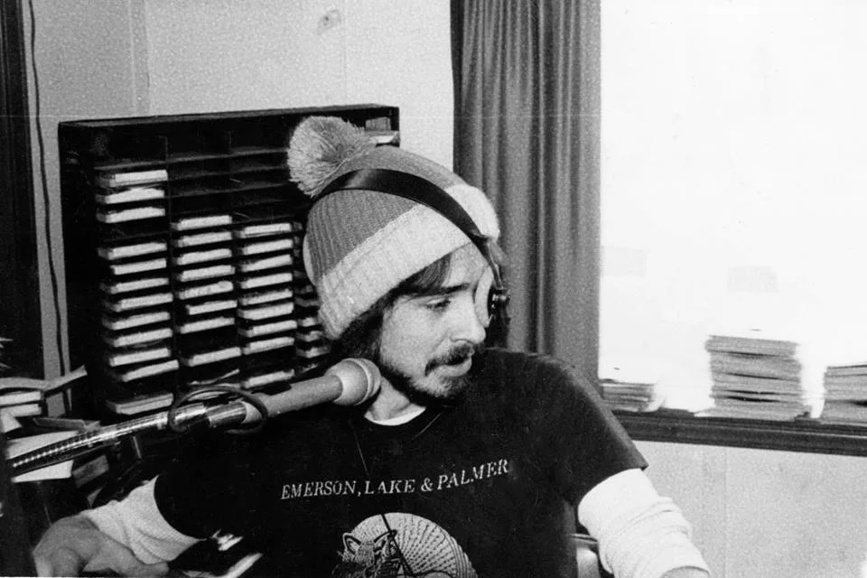 Knit caps with a pom pom, headphones as an eyepatch at KWPR.