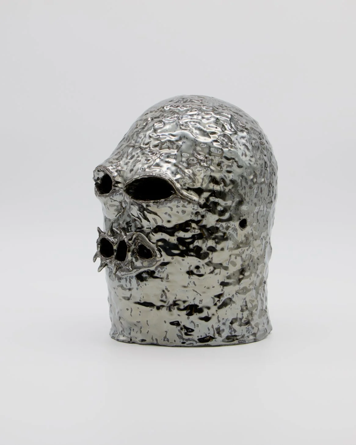   Helmet   2026  Ceramic and glaze  11" x 8” x 9”  