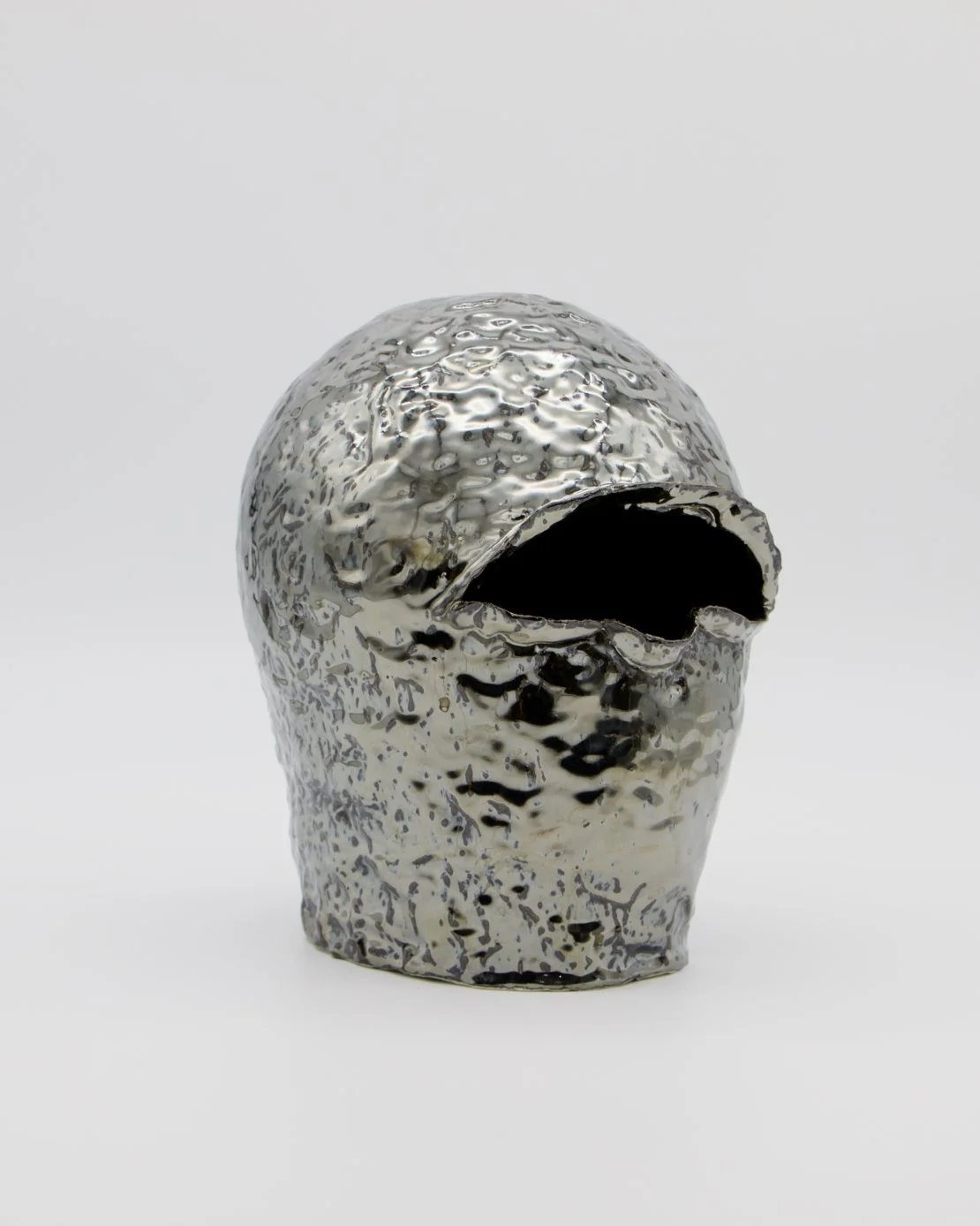   Helmet   2026  Ceramic and glaze  10.5" x 8” x 9”  