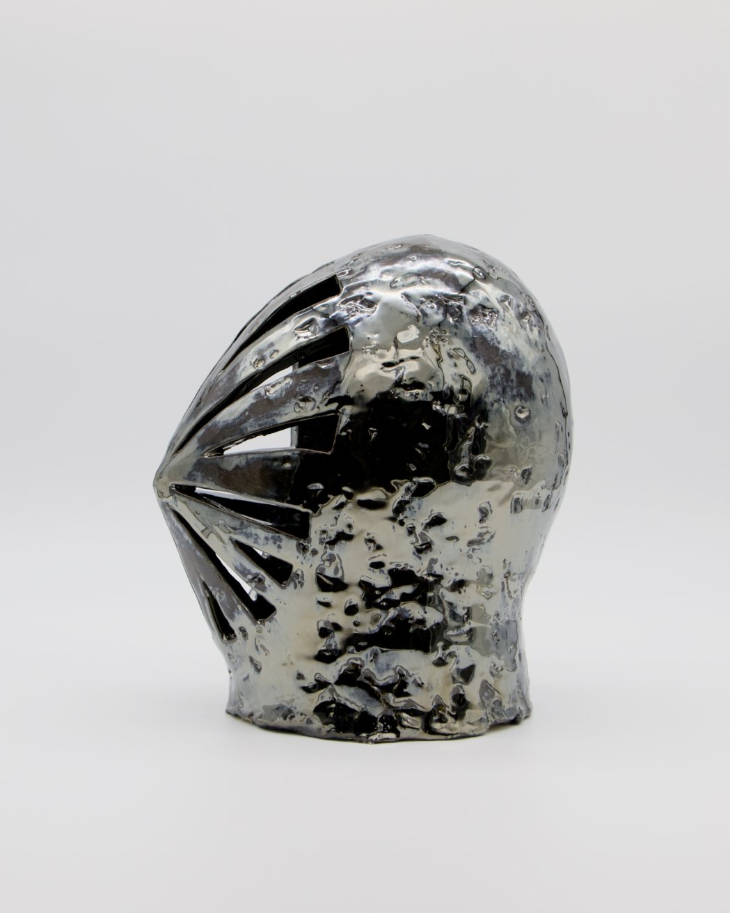   Helmet   2026  Ceramic and glaze  12” x 7” x 10” 