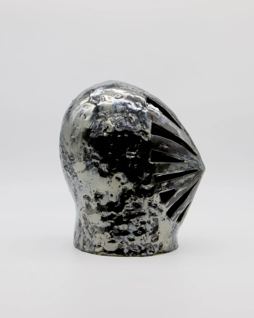   Helmet   2026  Ceramic and glaze  12” x 7” x 10” 