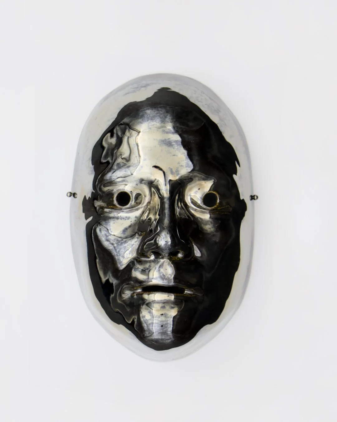   Mask   2025  Ceramic and glaze  8” x 5” x 3” 