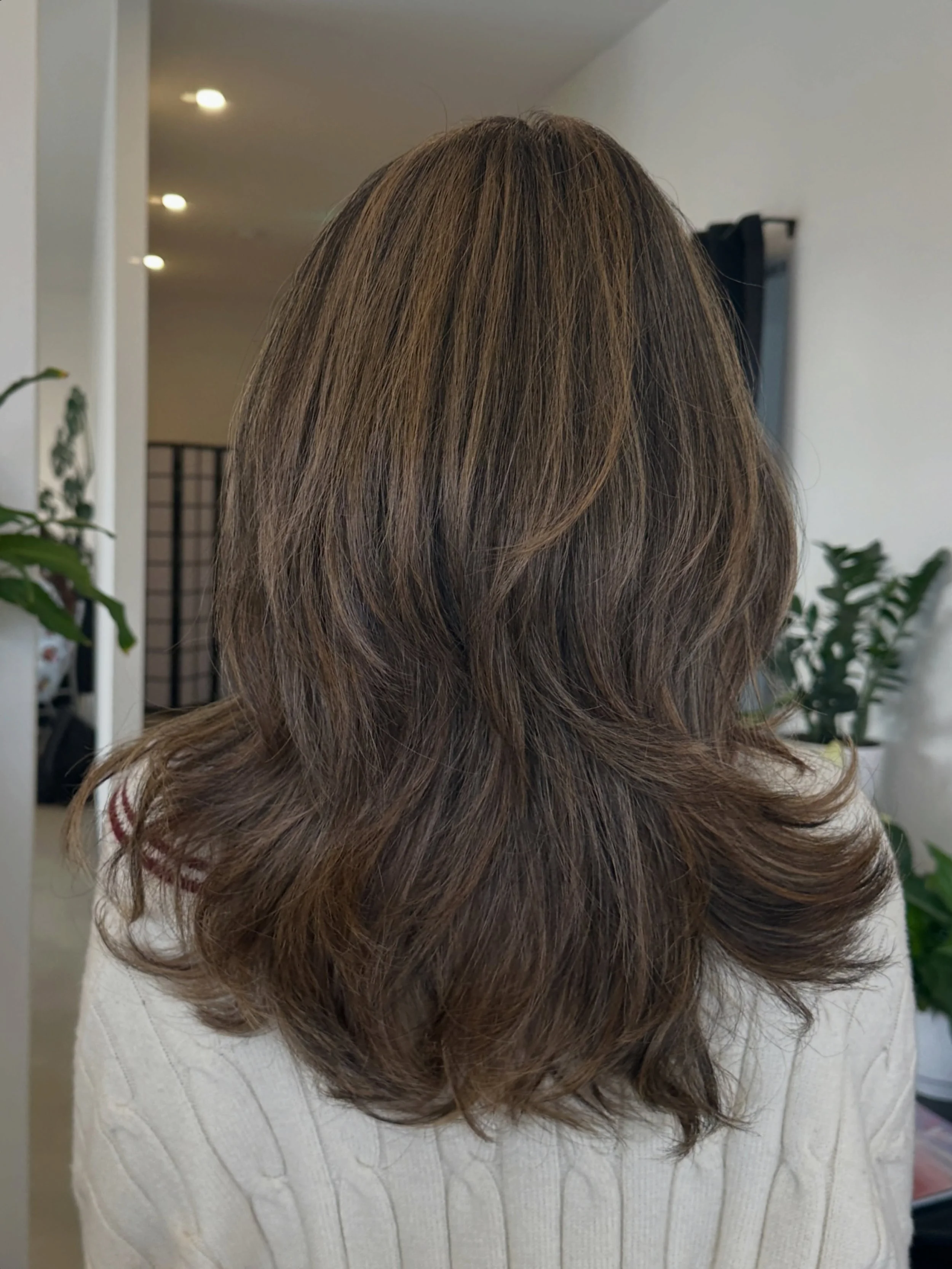 Breakup checklist:

✅ Cry a little
✅ Call your bestie
✅ Book a hair appointment 💇&zwj;♀️😂

This gorgeous mushroom brown paired with a butterfly cut is giving main character energy, and we&rsquo;re absolutely obsessed. 🤎🦋 What&rsquo;s the biggest 