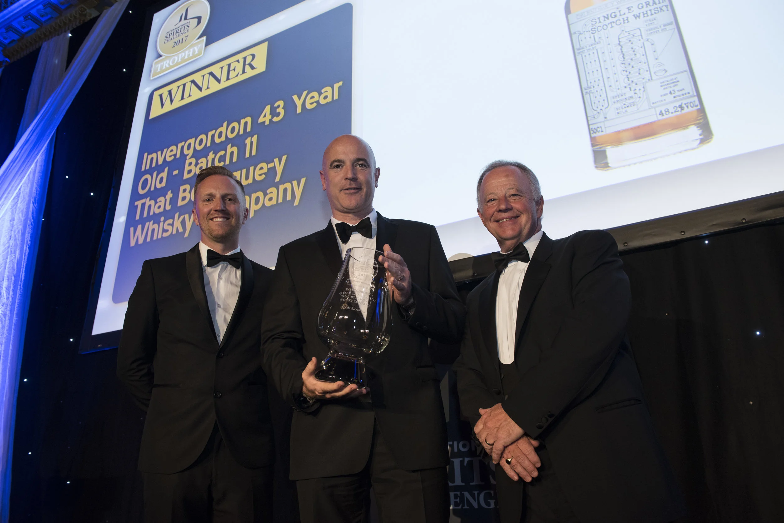 Adam Wyartt Global Brand Manager for Atom Brands picking up the coveted Trophy