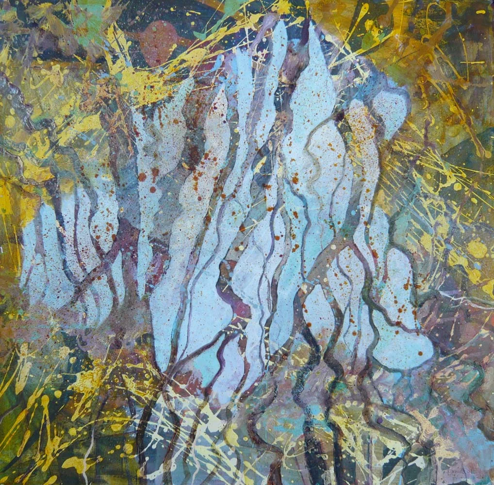 Trees reflectected in the stream