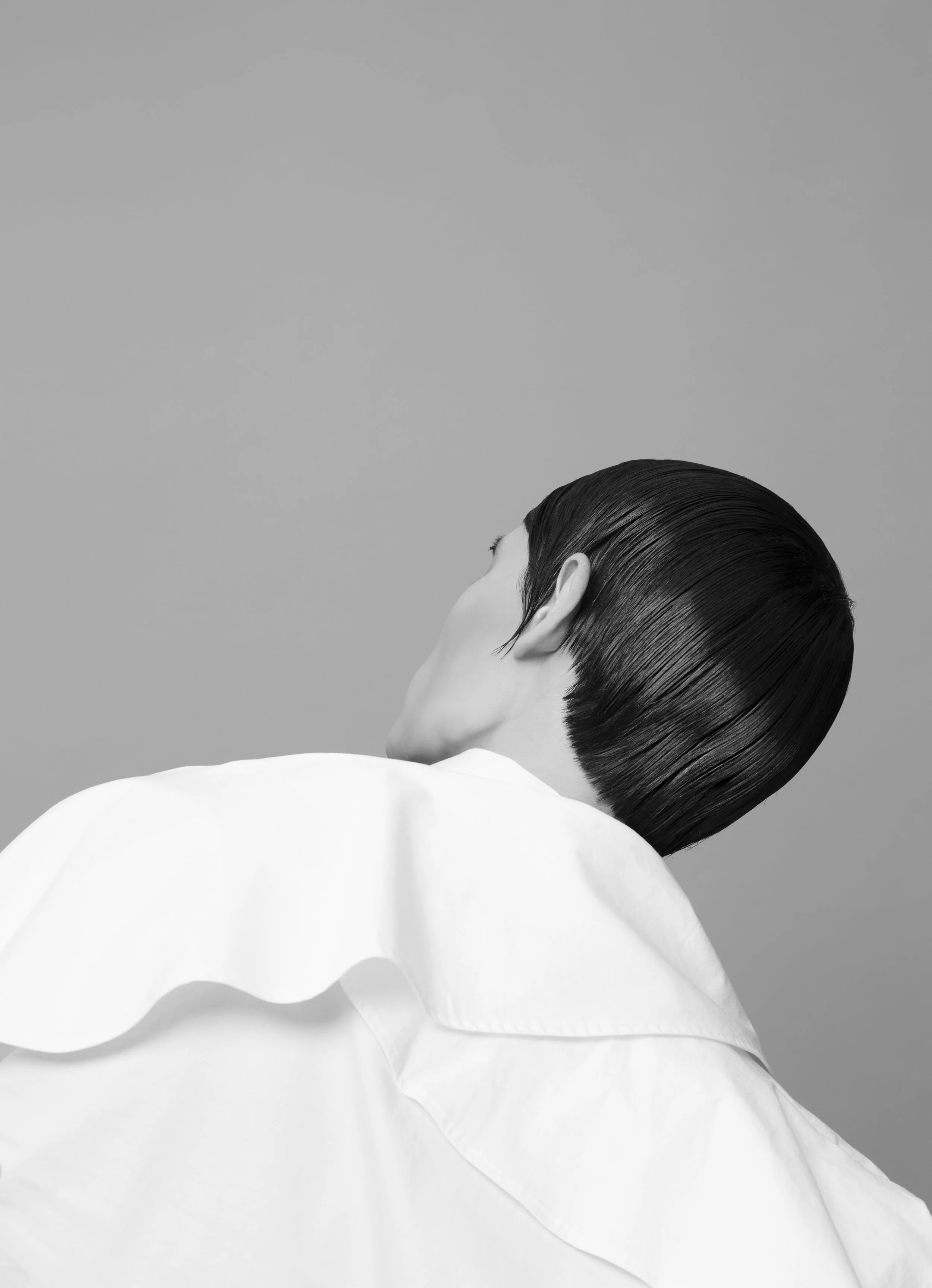 White ruffled shirt Burberry , Gray stripe trousers Alexander Wang.