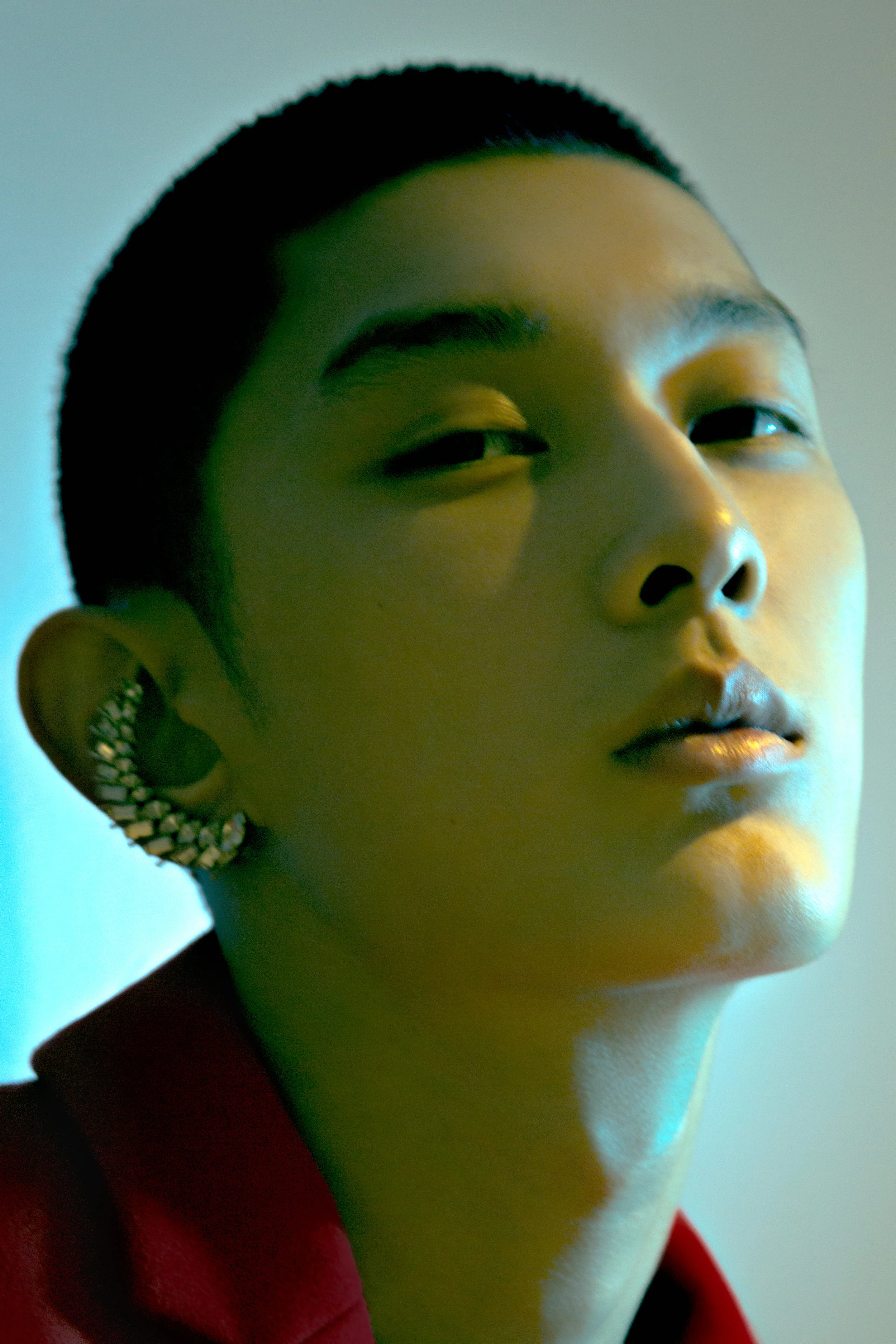 Red coat Marc by Marc Jacobs , Earrings Saint Laurent .