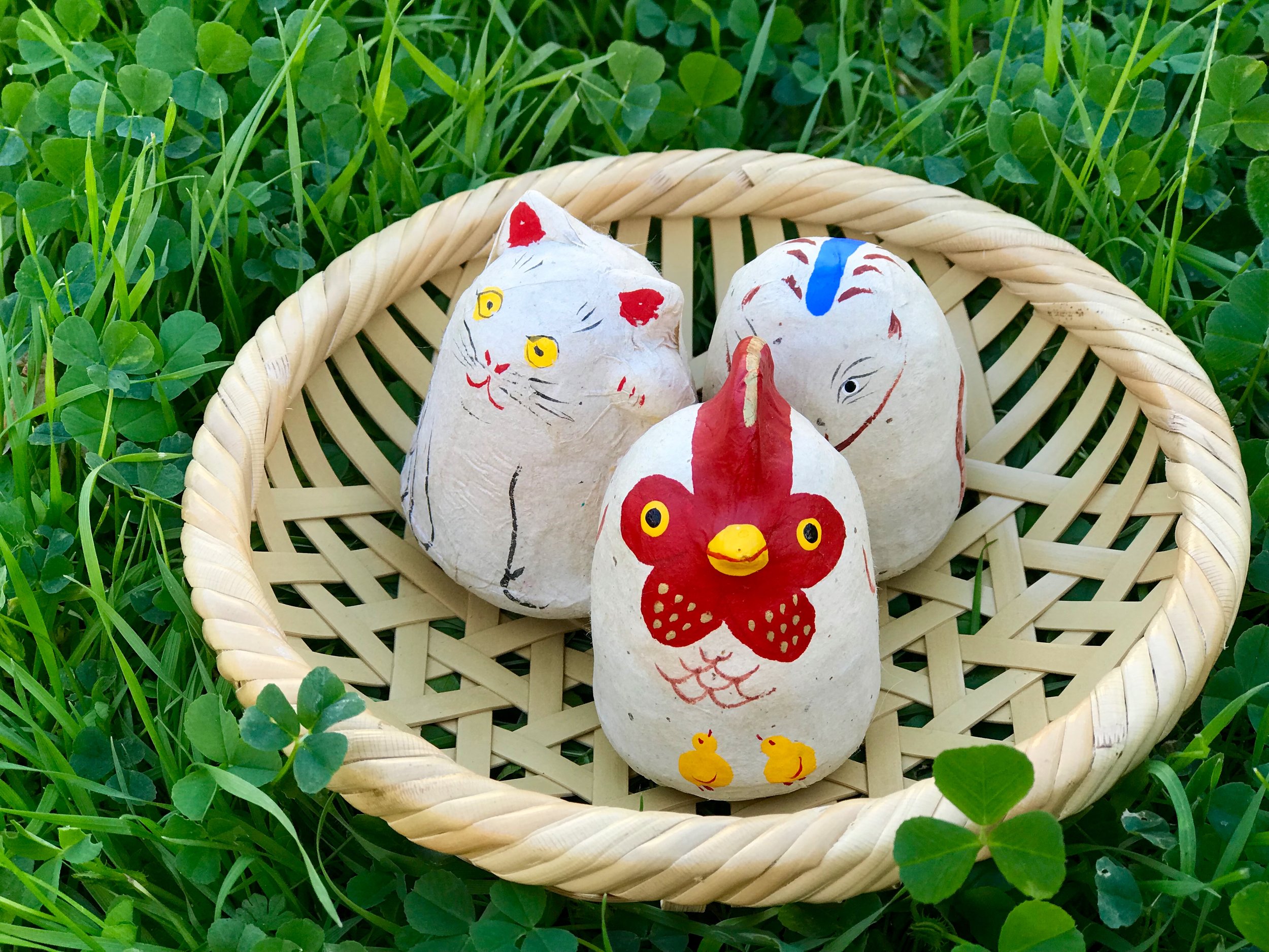 The whimsical figures and wall hangings conjure Japanese history, fantasy, and lore, depicting Daruma (or Bodhidarma), Maneki-neko (literally, beckoning cat), Tsuki-no-usagi (the moon rabbit) and many others. 