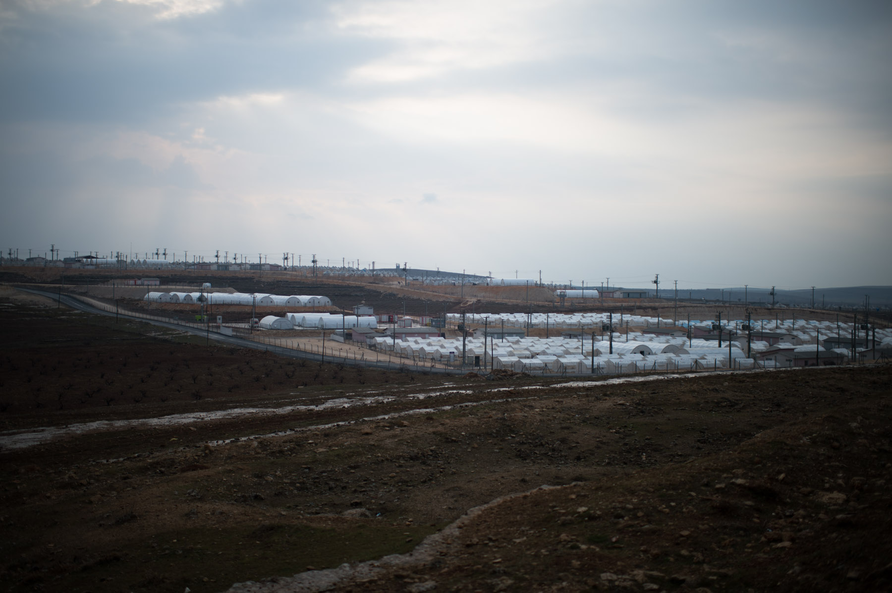  Traveling along the Turkish-Syrian border. A border that separates war from a fragile peace. Crossing it, is last hope for refugees to find shelter. A story in images for the Reporter sans frontières annual book 2014.    